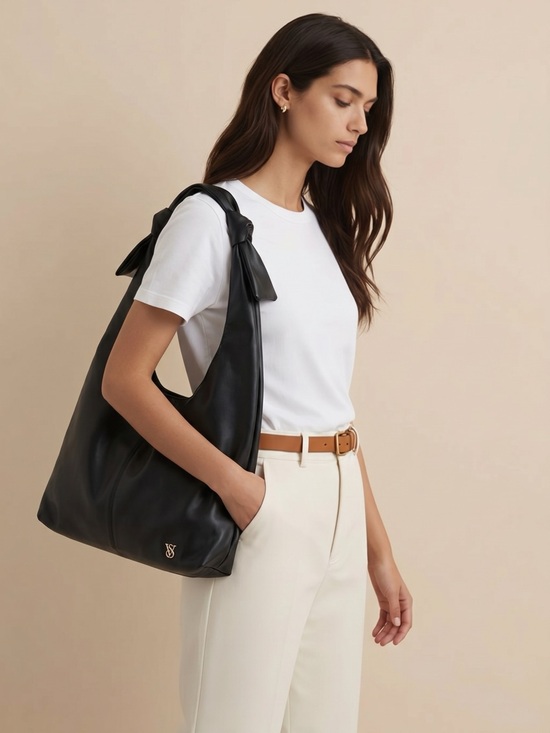 Victoria's Secret Handbags - Victoria's Secret Black Faux Leather  Hobo with Gold VS Emblem bag